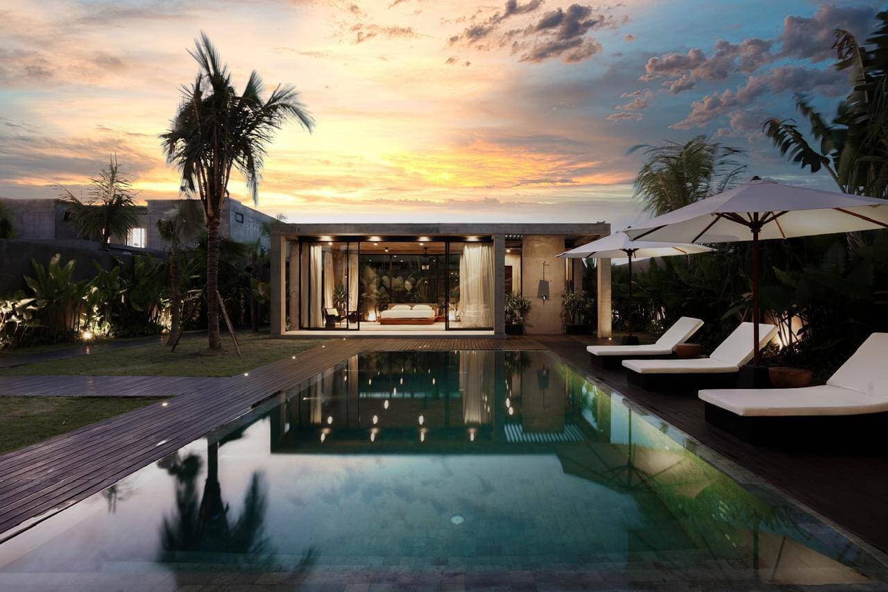 Modern single-storey villa with pool and deck at sunset in Bali — Frigate Bali
